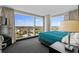 Bedroom with large windows offering scenic views and a comfortable, inviting ambiance at 107 S Ocean Blvd. # 1201, Myrtle Beach, SC 29577