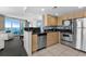 Modern kitchen features stainless steel appliances and a breakfast bar at 107 S Ocean Blvd. # 1201, Myrtle Beach, SC 29577