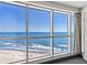 Breathtaking ocean view through a large window, showcasing the beach and horizon at 107 S Ocean Blvd. # 1201, Myrtle Beach, SC 29577