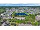 An aerial view of the neighborhood showcasing homes surrounding a beautiful lake at 1098 Stanton Pl., Myrtle Beach, SC 29579