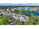 An aerial view of townhomes nestled within a community with a lake and lush landscaping at 1098 Stanton Pl., Myrtle Beach, SC 29579