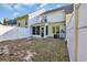 Fenced backyard featuring a screened-in porch and air conditioning unit at 1098 Stanton Pl., Myrtle Beach, SC 29579