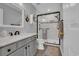 Renovated bathroom with black framed glass shower, white subway tiles, and modern fixtures at 1098 Stanton Pl., Myrtle Beach, SC 29579