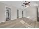 Large bedroom with neutral walls leading to the bathroom at 1098 Stanton Pl., Myrtle Beach, SC 29579