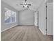 Spacious bedroom with vaulted ceiling, ceiling fan, and natural light from a large window at 1098 Stanton Pl., Myrtle Beach, SC 29579