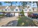 Street view of townhomes with driveways, garages, and landscaping, highlighting community charm and curb appeal at 1098 Stanton Pl., Myrtle Beach, SC 29579
