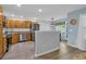 Well-lit kitchen with wood-look floors and modern appliances open to the dining area at 1098 Stanton Pl., Myrtle Beach, SC 29579