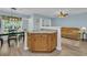 Kitchen island with cabinets, granite countertop, and view to the breakfast nook and living room at 1098 Stanton Pl., Myrtle Beach, SC 29579
