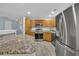 Kitchen features stainless steel appliances, light wood cabinets, and granite countertops at 1098 Stanton Pl., Myrtle Beach, SC 29579
