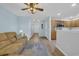 Open-concept living room showing wood-look floors and cozy furnishings; ideal for relaxation and entertaining at 1098 Stanton Pl., Myrtle Beach, SC 29579