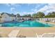 Beautiful community pool with lounge chairs and well-maintained deck offering residents a relaxing retreat at 1098 Stanton Pl., Myrtle Beach, SC 29579