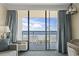 Balcony view of the beach and ocean, with seating for enjoying the scenery at 1105 S Ocean Blvd. # 422, Myrtle Beach, SC 29577
