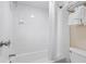 Clean, white bathroom with shower and bathtub combination, plus towel rack at 1105 S Ocean Blvd. # 422, Myrtle Beach, SC 29577