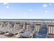 Relaxing beachside lounge chairs offer stunning views of the ocean and sandy beach at 1105 S Ocean Blvd. # 422, Myrtle Beach, SC 29577