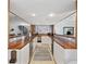 Modern wet bar featuring wood countertops, a tile backsplash, and stainless steel appliances at 1114 S Dogwood Dr., Surfside Beach, SC 29575