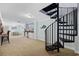 Finished basement with spiral staircase leading to a bar area and dining space at 1114 S Dogwood Dr., Surfside Beach, SC 29575