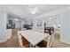 Open floorplan featuring a dining table, wet bar, spiral staircase, and foosball table at 1114 S Dogwood Dr., Surfside Beach, SC 29575