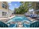 Sparkling pool surrounded by brick patio and comfortable seating; perfect for enjoying sunny days at 1114 S Dogwood Dr., Surfside Beach, SC 29575