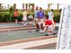 Active senior residents playing bocce ball in the community on a sunny day at 1233 Lady Bird Way, North Myrtle Beach, SC 29582