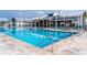 Sparkling community pool with sun loungers, umbrellas, and easy access for swimming in a resort setting at 1233 Lady Bird Way, North Myrtle Beach, SC 29582