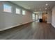 Open living room features recessed lighting and wood-look flooring at 1233 Lady Bird Way, North Myrtle Beach, SC 29582