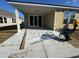 Covered patio area with sliding glass doors offering seamless indoor-outdoor living and a place to relax at 1233 Lady Bird Way, North Myrtle Beach, SC 29582