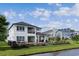 Expansive backyard with pool, lounging areas, and serene water views at 1315 Ashboro Ct., Myrtle Beach, SC 29579