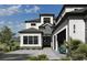 Elegant home exterior boasting a unique front door, stone accents, and a spacious driveway at 1315 Ashboro Ct., Myrtle Beach, SC 29579