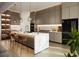 Gourmet kitchen featuring a large island, modern appliances, and sleek cabinetry at 1315 Ashboro Ct., Myrtle Beach, SC 29579