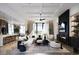 Modern living room with stylish furniture, fireplace, and abundant natural light at 1315 Ashboro Ct., Myrtle Beach, SC 29579