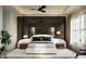 Luxurious main bedroom featuring plush carpeting, ambient lighting, and modern decor at 1315 Ashboro Ct., Myrtle Beach, SC 29579
