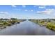 Scenic waterway view featuring waterfront homes with private docks and beautiful landscaping at 1315 Ashboro Ct., Myrtle Beach, SC 29579
