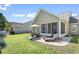 Home's backyard has ample seating for entertaining and overlooks the golf course at 136 Regency Dr., Conway, SC 29526