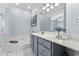 Relaxing bathroom with a soaking tub, modern vanity, and light blue accents to create a spa feel at 136 Regency Dr., Conway, SC 29526