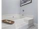 Bathroom close-up featuring a large soaking tub with decorative shell arrangement detail at 136 Regency Dr., Conway, SC 29526