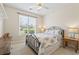 Bright bedroom featuring a comfortable bed and large window with a view, offering a serene retreat at 136 Regency Dr., Conway, SC 29526