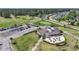 Aerial shot of the clubhouse and parking lot with golf course in the background at 136 Regency Dr., Conway, SC 29526
