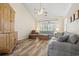 Spacious living room boasts vaulted ceilings and laminate floors, enhancing its appeal at 136 Regency Dr., Conway, SC 29526