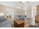 Spacious living room boasts laminate floors and natural light, enhancing its appeal at 136 Regency Dr., Conway, SC 29526