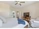 Cozy bedroom with ensuite bathroom access, comfortable seating, and plenty of natural light at 136 Regency Dr., Conway, SC 29526