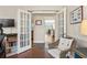 Bright office features French doors and view of dining room, enhancing its appeal at 136 Regency Dr., Conway, SC 29526