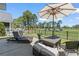 Outdoor patio features comfortable seating and views of the lush green golf course at 136 Regency Dr., Conway, SC 29526