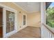 Spacious outdoor balcony with wood flooring and a view of the surrounding neighborhood at 138 Lumbee Circle # 17, Pawleys Island, SC 29585