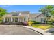 Inviting community clubhouse with a welcoming entrance and beautiful landscaping at 141 Wickham Ct., Pawleys Island, SC 29585