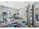 Community gym equipped with modern fitness equipment and ample natural light at 141 Wickham Ct., Pawleys Island, SC 29585