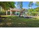 Community playground featuring a swing set, slide, and covered picnic area at 141 Wickham Ct., Pawleys Island, SC 29585