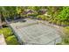 Well-maintained community tennis court surrounded by lush landscaping at 141 Wickham Ct., Pawleys Island, SC 29585