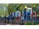 View of Kiwanis playground with colorful play structures and secure fencing at 1419 Nokota Dr., Conway, SC 29526