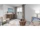 Cozy living room with a comfortable seating area, a large window with scenic views, and stylish decor at 1439 Nokota Dr., Conway, SC 29526