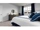 Bright main bedroom with a view, plush carpeting, and stylish furniture, providing a relaxing retreat at 1439 Nokota Dr., Conway, SC 29526